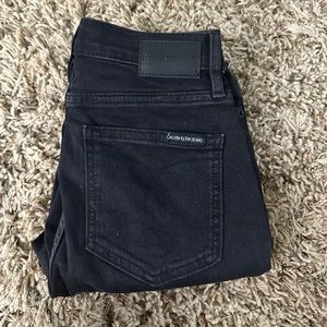 Never been worn Calvin Klein Black High Rise Jegging. Size 25.